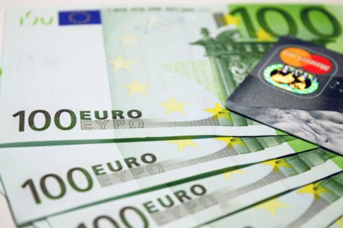 credit card and cash from Europe