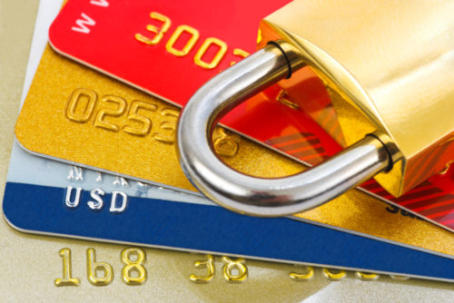 Padlock on top of credit cards