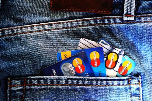A back pocket holding several different credit cards.