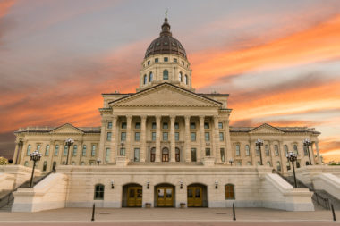 An image of the state capitol building in Topeka, KS.