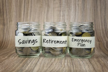 Mason Jars Labelled “Savings,” “Retirement,” and “Emergency Plan.”