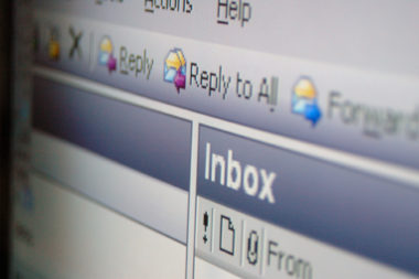 Close-up of a screen displaying an email inbox