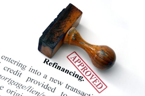 A refinancing contract is rubber stamped as "approved."