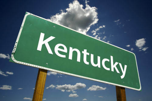 A road sign that reads "Kentucky."