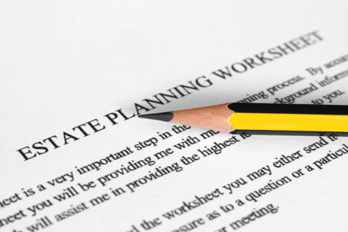 A pencil sits on top of an estate planning worksheet.
