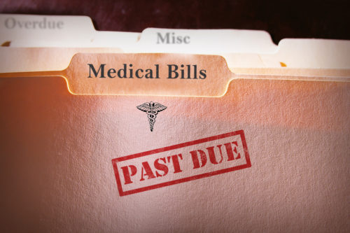 A folder labeled "medical bills" is rubber stamped as "past due."