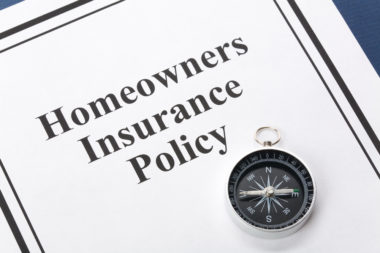 An image of a document that is labeled "homeowners insurance policy."