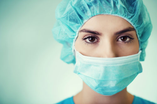 A portrait shot of a young female surgeon.