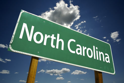 A road sign that reads "North Carolina."