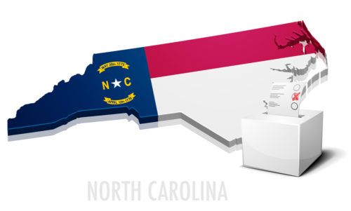 An image of the NC flag in the shape of North Carolina, with a ballot box in the foreground.
