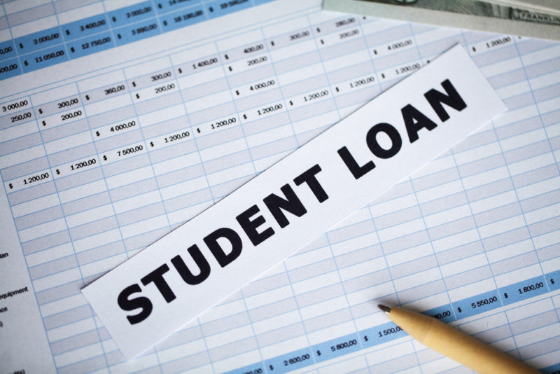 The words "student loan" superimposed on calculations of retirement and saving figures.