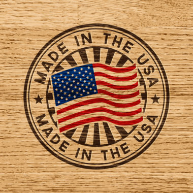 A stamp that reads "made in the USA" on a wooden background.