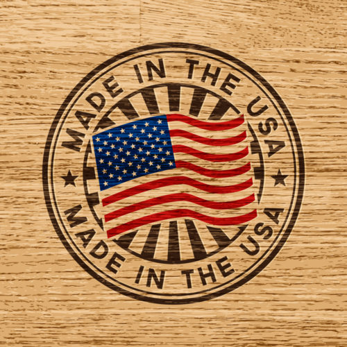 A stamp that reads "made in the USA" on a wooden background.