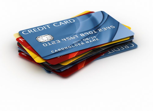 A pile of different types of credit cards.