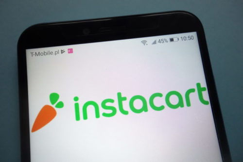 A smartphone's screen displays the Instacart app.