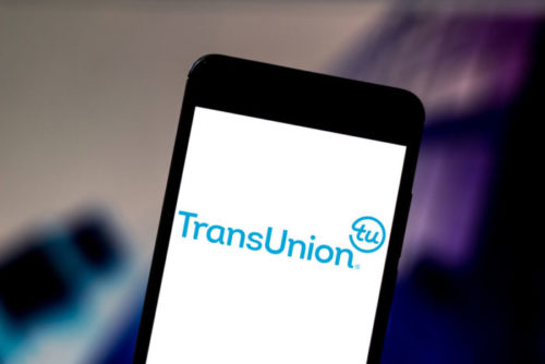 A smartphone displays the TransUnion app.
