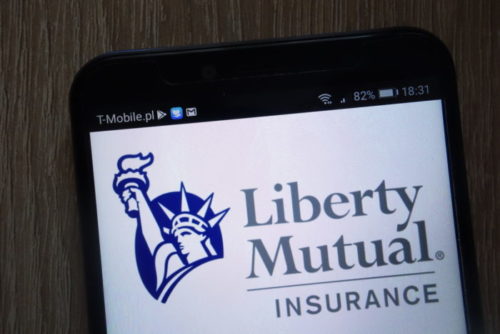 A smartphone displays the Liberty Mutual Insurance app.