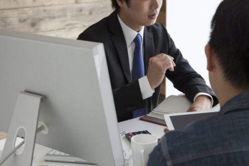 An agent explaining the nature of a personal loan to a client.