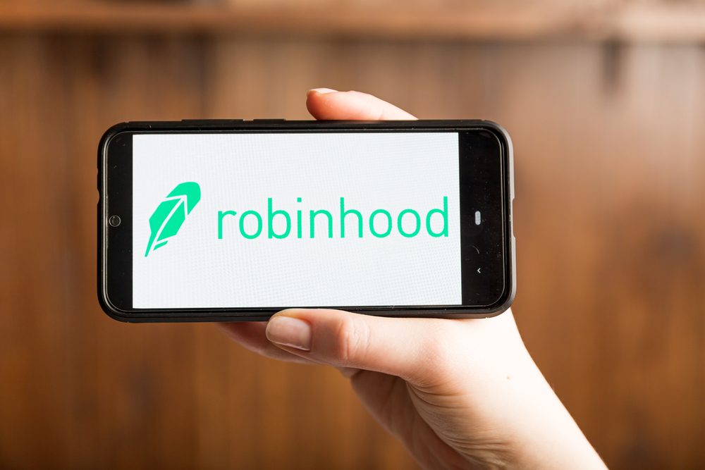 A phone is open to the Robinhood app.