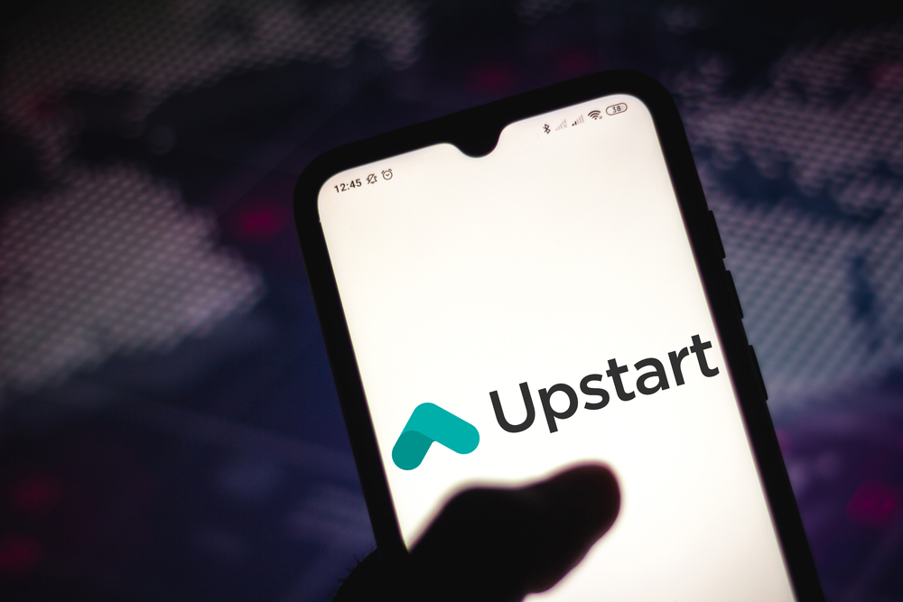 A phone is open to the Upstart app.