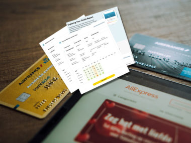 credit cards and credit report on a table