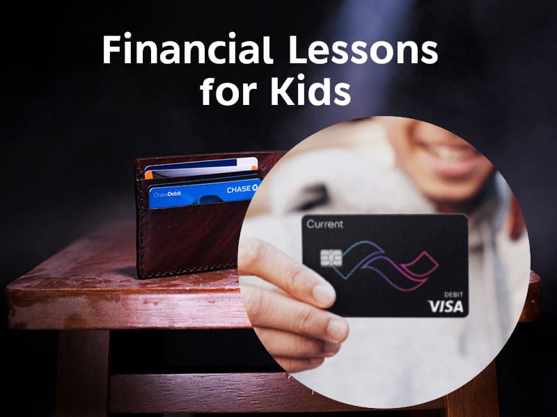 a kid holding credit card with a wllet having credit cards in the background